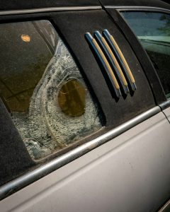 a-broken-windshield-of-a-car-with-a-broken-window-crhpqoxsnj0